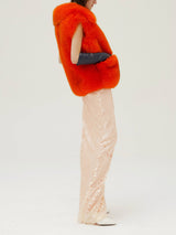Oversized Orange Fox Fur Vest Front Pockets.